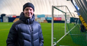 Juho Meriläinen in Garam Masala football hall. There is a goal behind him.